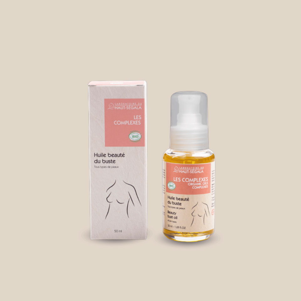 Photo produit : Huile de beauté du buste du Laboratoire du Haut-Séguala, présentée dans un flacon transparent à pompe avec bouchon et une boîte recyclée, 50 ml.
